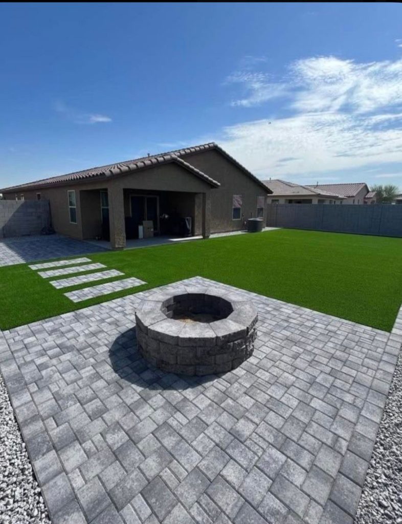 Patio and fire pit at a completed home
